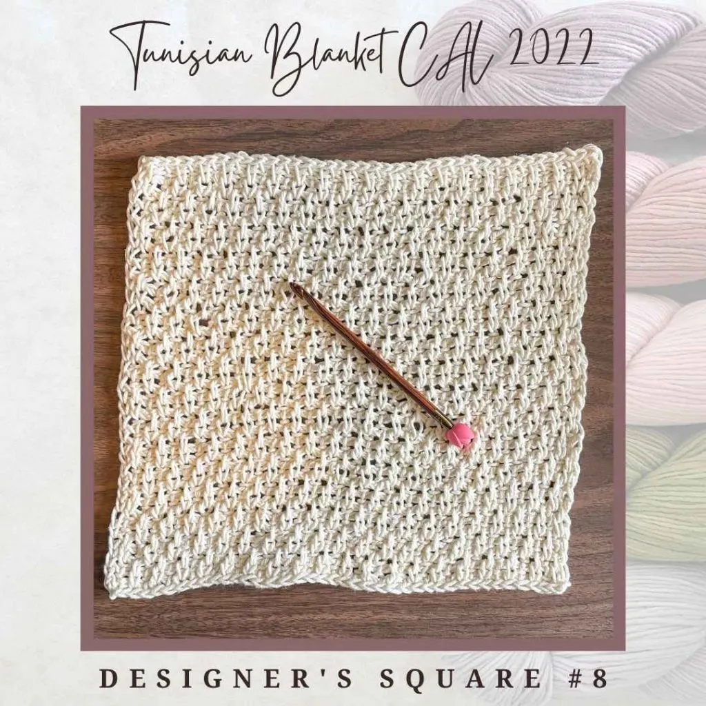 Square #2 of the Tunisian Crochet Blanket CAL of 2022 hosted by KnitterKnotter. This is the designer's original square that is made with two colors - blue and white. The white section forms the frame and the blue/white honeycomb section forms the picture section.