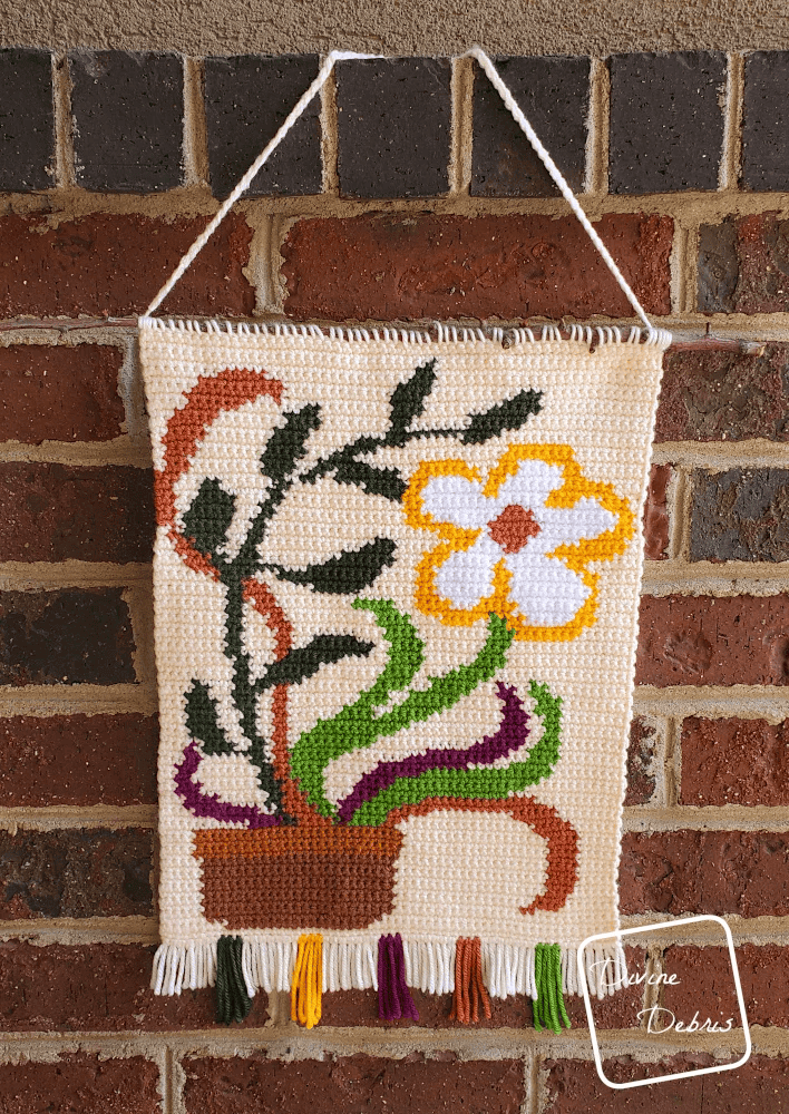 Groovy Bloom Wall Hanging Free Crochet Pattern – Retro Vibes by Divine Debris